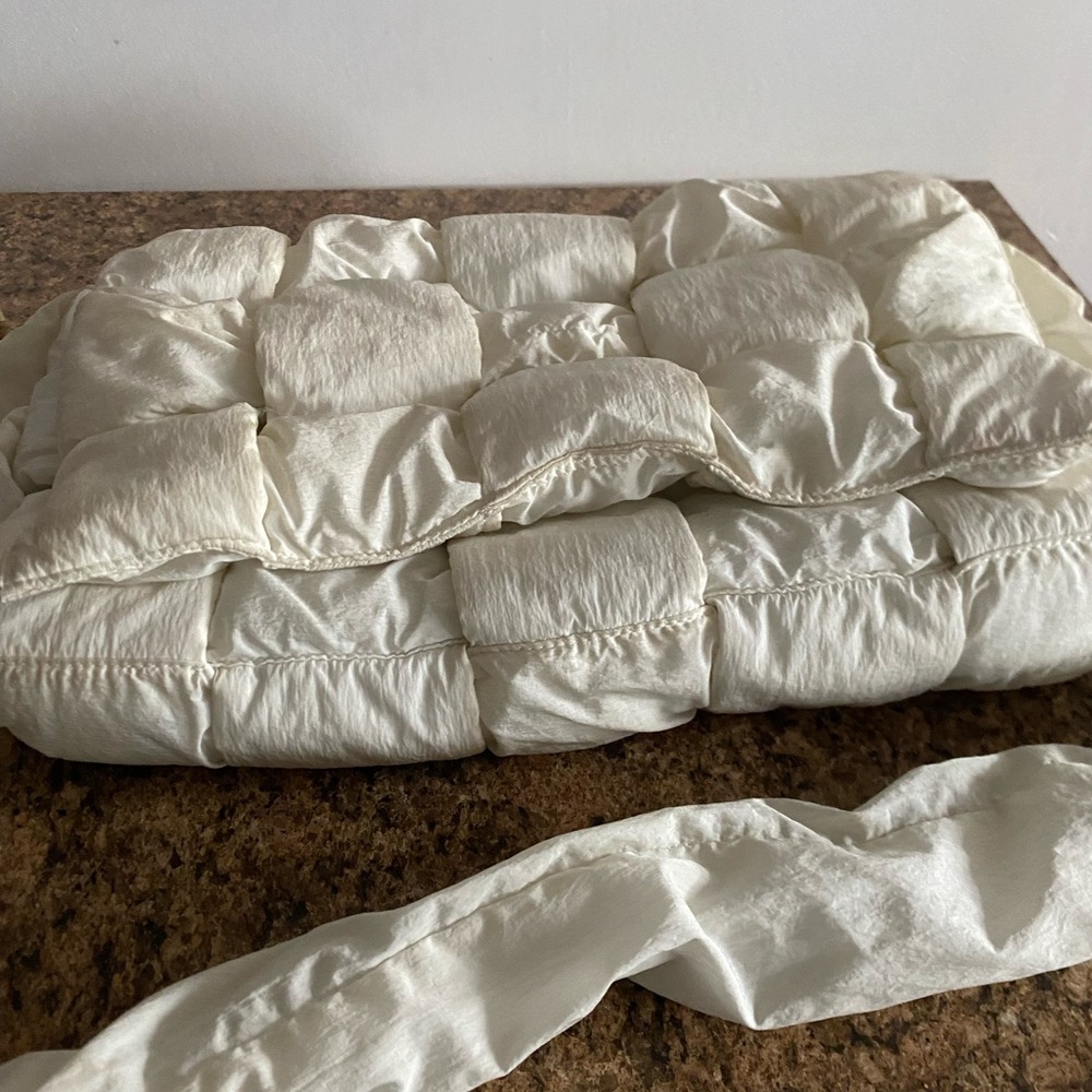 Bottega Veneta Intreciato padded tech maxi messenger bag.